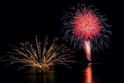 Firework display at night