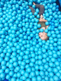 High angle view of person relaxing in swimming pool