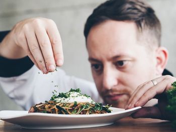 Close-up of boy eating food