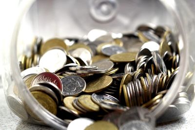 Close-up of coins on table