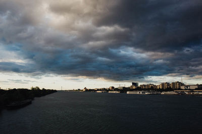 View of city against cloudy sky