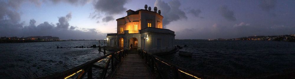 Panoramic view of sea against sky at dusk