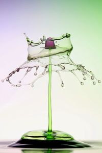 Close-up of electric lamp against white background