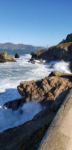 Scenic view of sea against clear sky