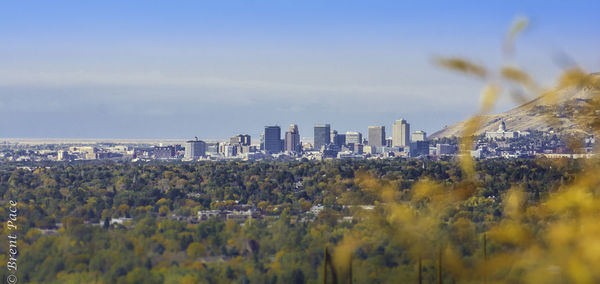 Panoramic view of cityscape against sky