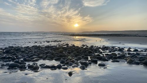 Scenic view of sea against sky during sunset