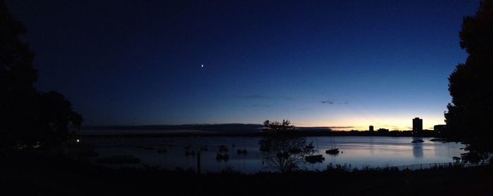 Scenic view of calm sea against clear sky