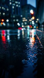 Surface level of wet street at night