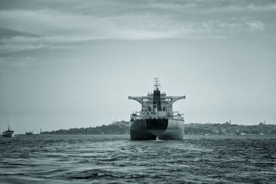 Ship in sea against sky