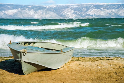 Boat moored on shore