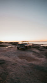 Scenic view of sea against clear sky during sunset