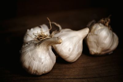 Close-up of garlic on table