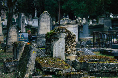 View of cemetery against built structures