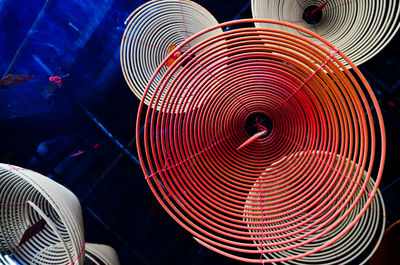 Low angle view of spiral decorations hanging on ceiling