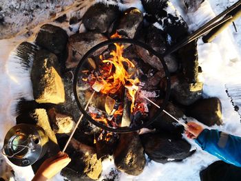 High angle view of bonfire on barbecue grill