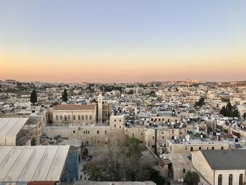 High angle view of townscape against sky at sunset