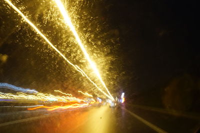 Light trails on road at night