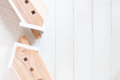 High angle view of white wooden wall at home