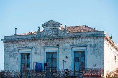 Low angle view of building against clear sky