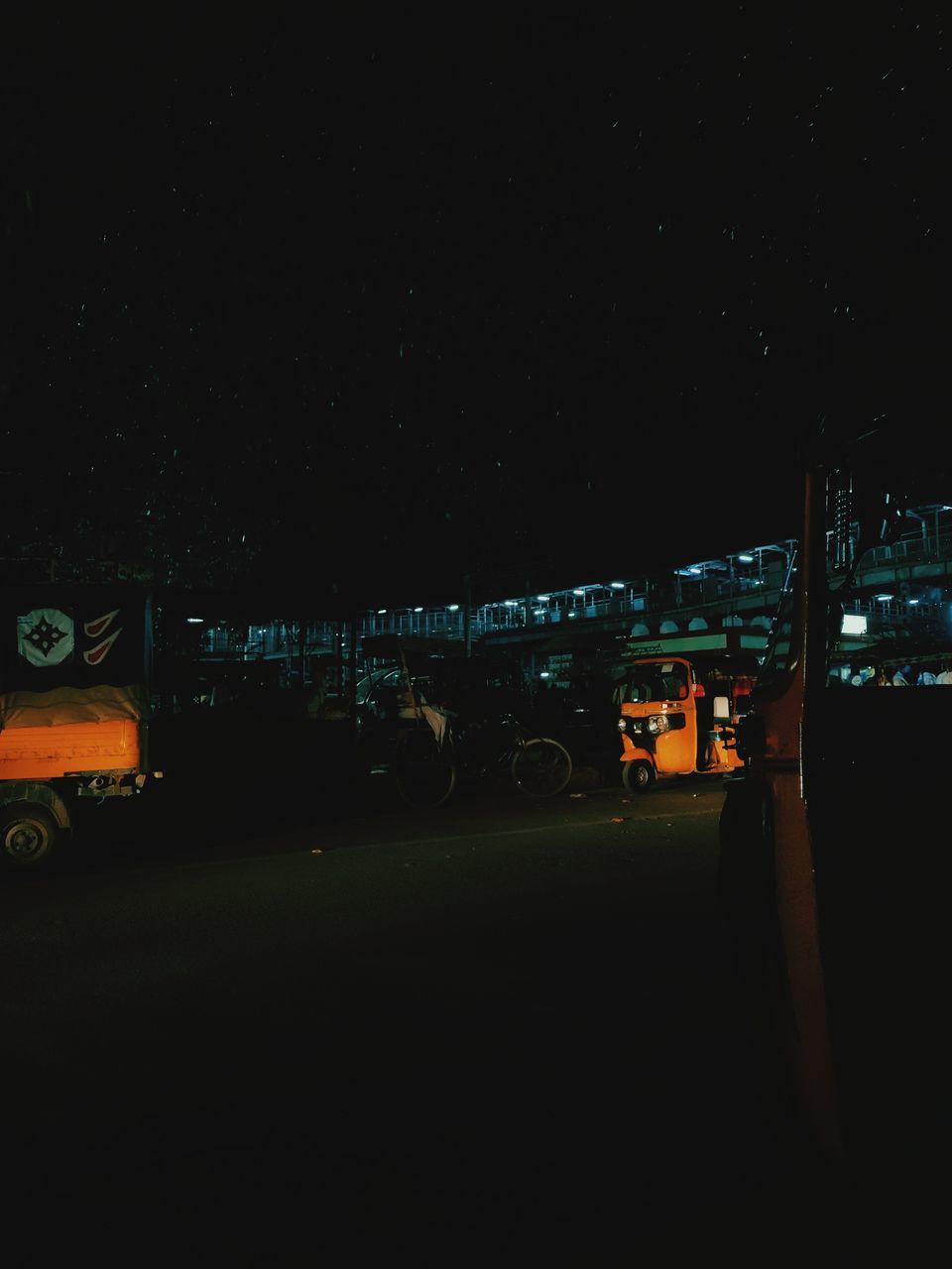 night, darkness, illuminated, sky, light, architecture, transportation, star, astronomical object, nature, mode of transportation, no people, built structure, city, land vehicle, vehicle, car, midnight, building exterior, motor vehicle, space, dark, outdoors, road, street, astronomy