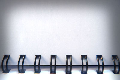 Close-up of piano against white background