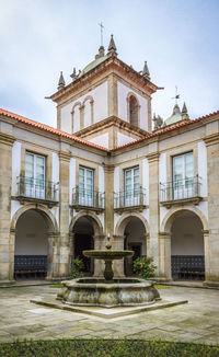 Low angle view of historic building against sky