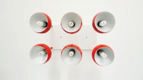 Close-up of coins over white background