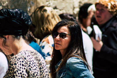 Portrait of people wearing sunglasses