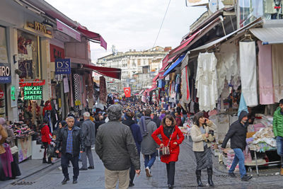 People walking on street in city