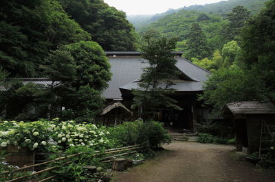 View of built structure with trees in foreground