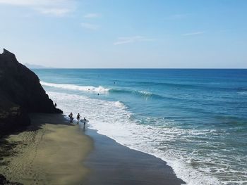 Scenic view of sea against clear blue sky