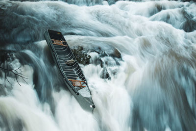 High angle view of waterfall in sea