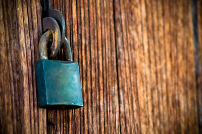 Close-up of padlock on door