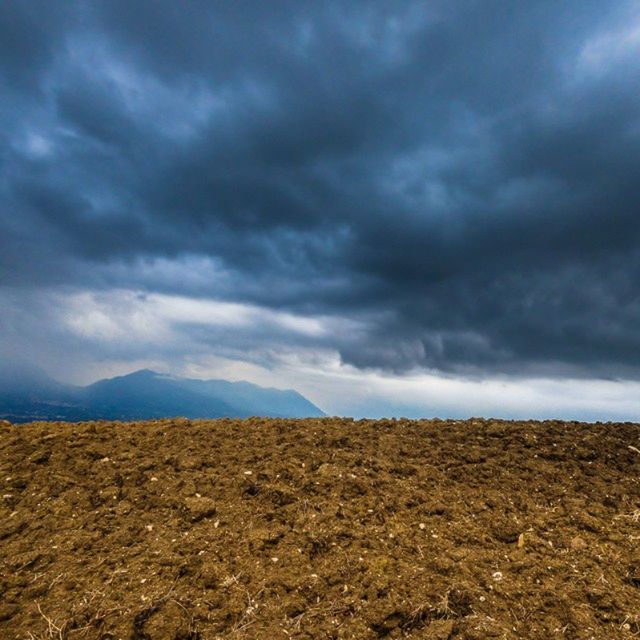 sky, cloud - sky, cloudy, weather, overcast, tranquility, tranquil scene, scenics, storm cloud, beauty in nature, nature, landscape, cloud, cloudscape, dramatic sky, idyllic, non-urban scene, mountain, low angle view, outdoors