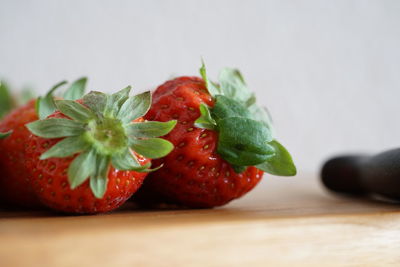 Close-up of chopped fruits on table