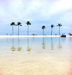 Scenic view of sea against cloudy sky