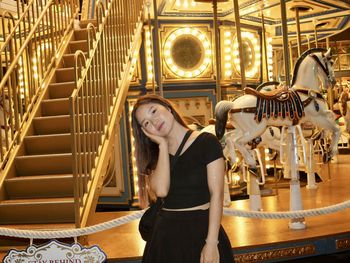 Portrait of young woman standing in temple