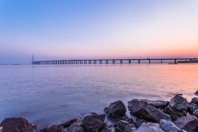 Scenic view of sea against sky during sunset