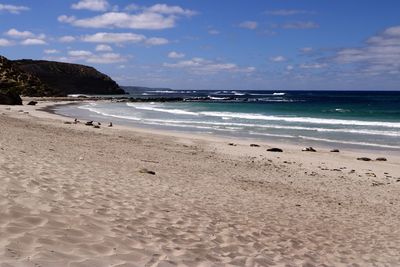 Scenic view of beach against sky