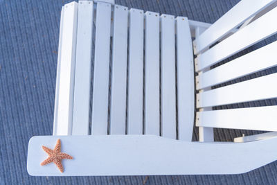 High angle view of artificial starfish on chair