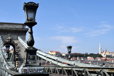 View of built structures against blue sky