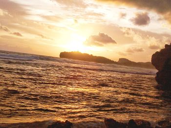 Scenic view of sea against sky during sunset