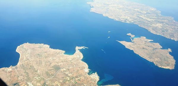 High angle view of rocks in sea