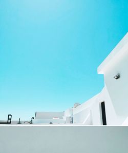 Low angle view of building against clear blue sky