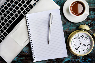 High angle view of coffee cup on table