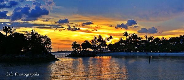 Scenic view of dramatic sky over sea during sunset