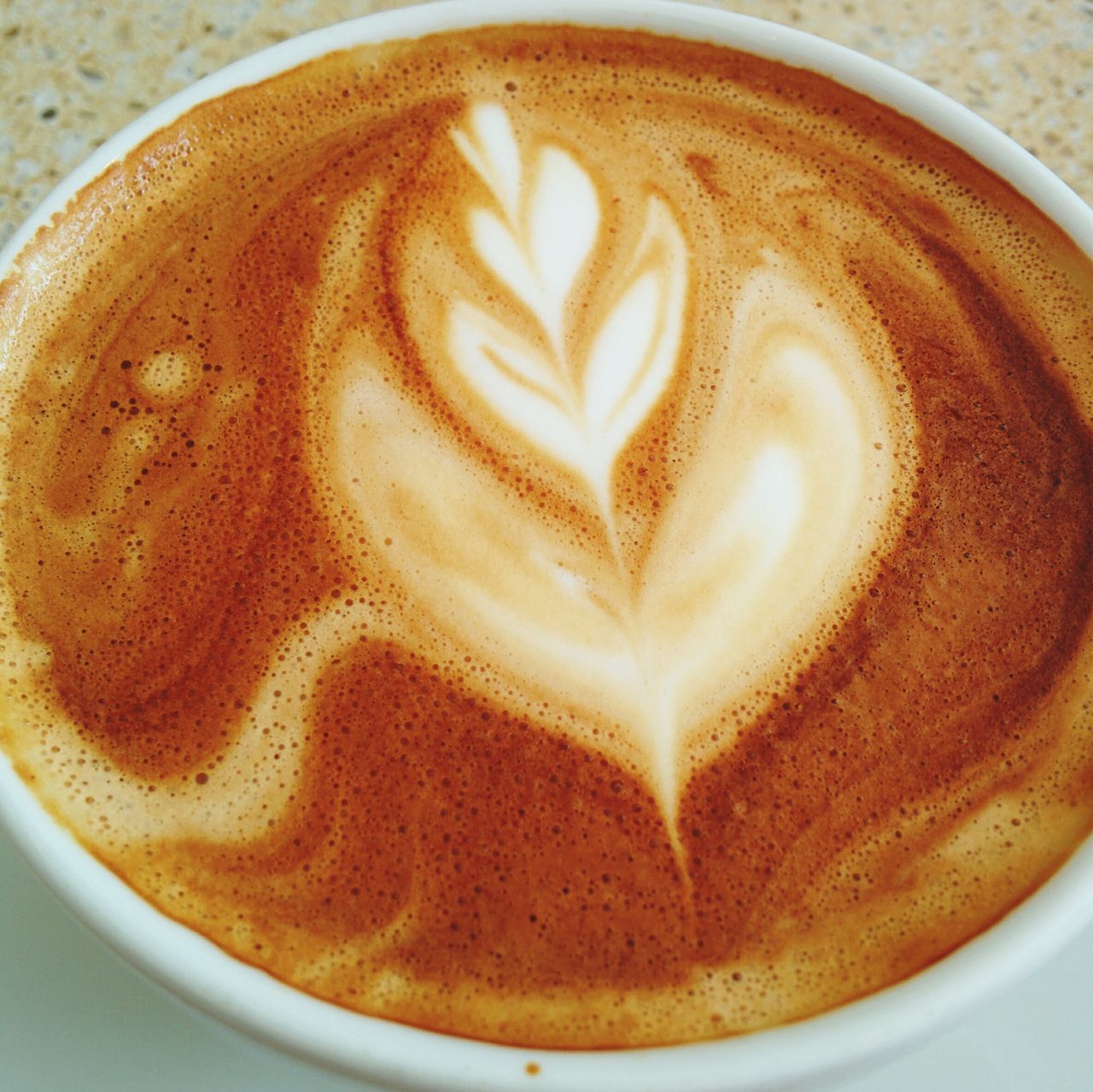 food and drink, drink, refreshment, indoors, coffee cup, frothy drink, freshness, coffee - drink, cappuccino, close-up, froth art, still life, coffee, table, saucer, high angle view, latte, directly above, heart shape, cup