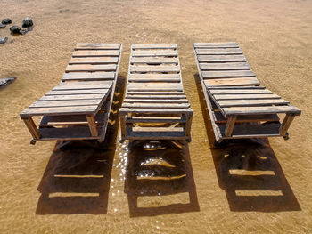 High angle view of empty chairs on table
