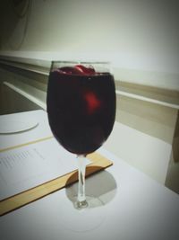 Close-up of wineglass on table