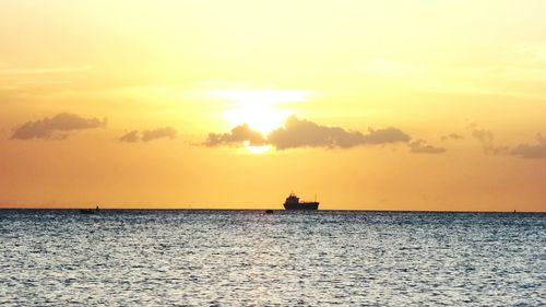 Scenic view of sea at sunset